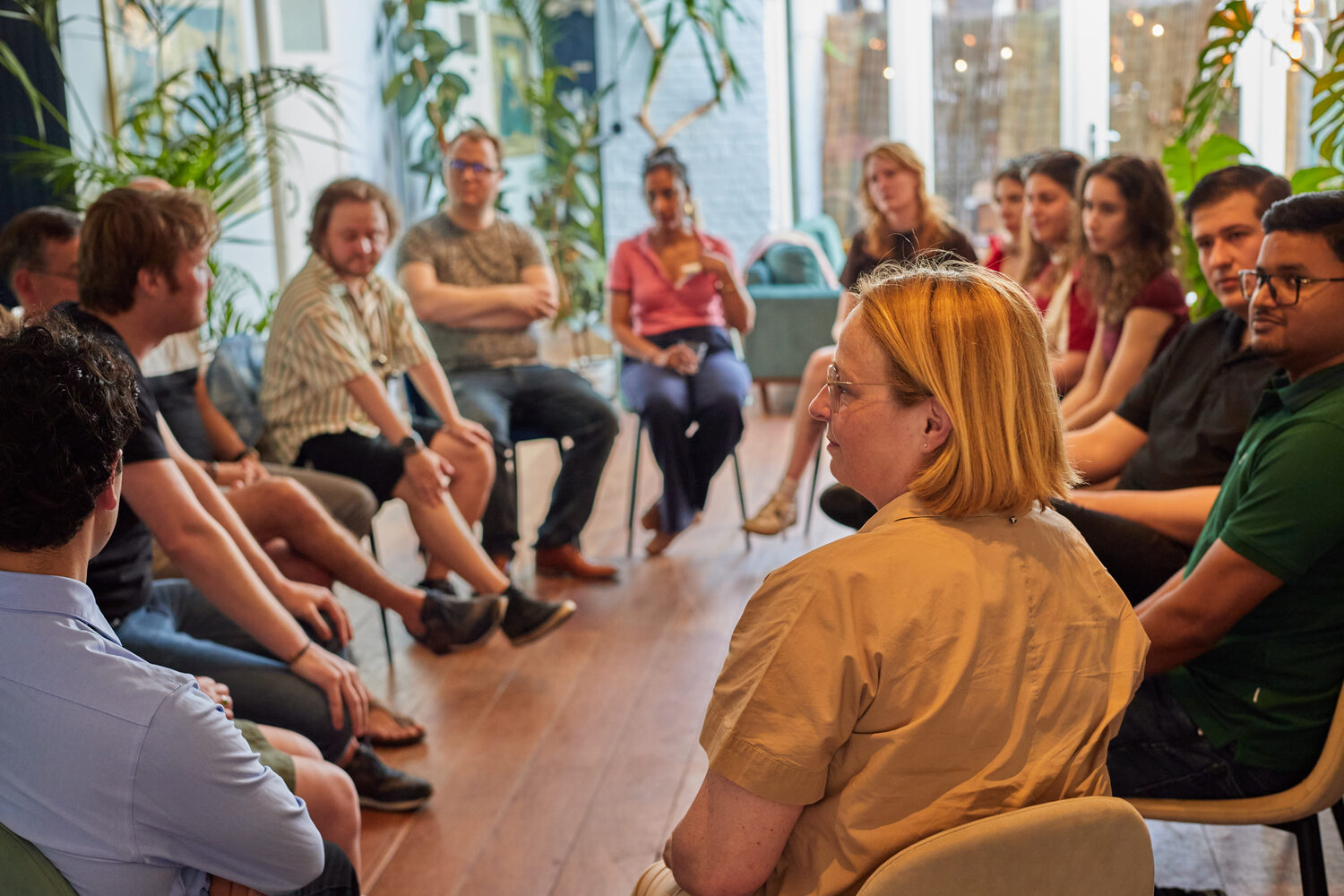 Participants gathered in a dialogue circle